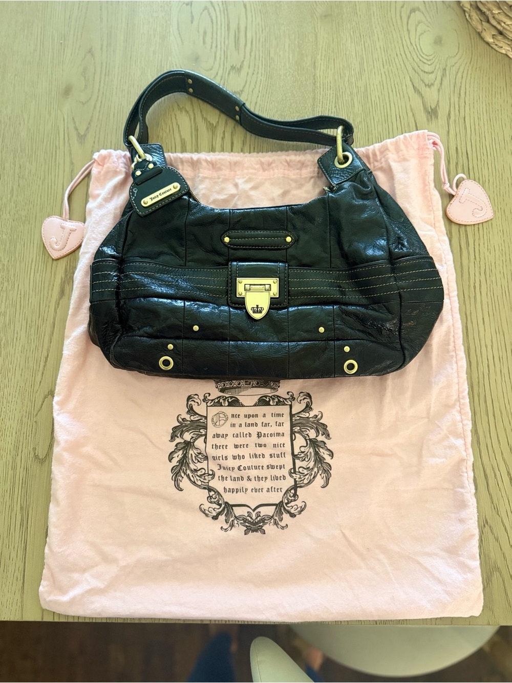Juicy Couture Black Leather Shoulder Bag with Gold Hardware Accents